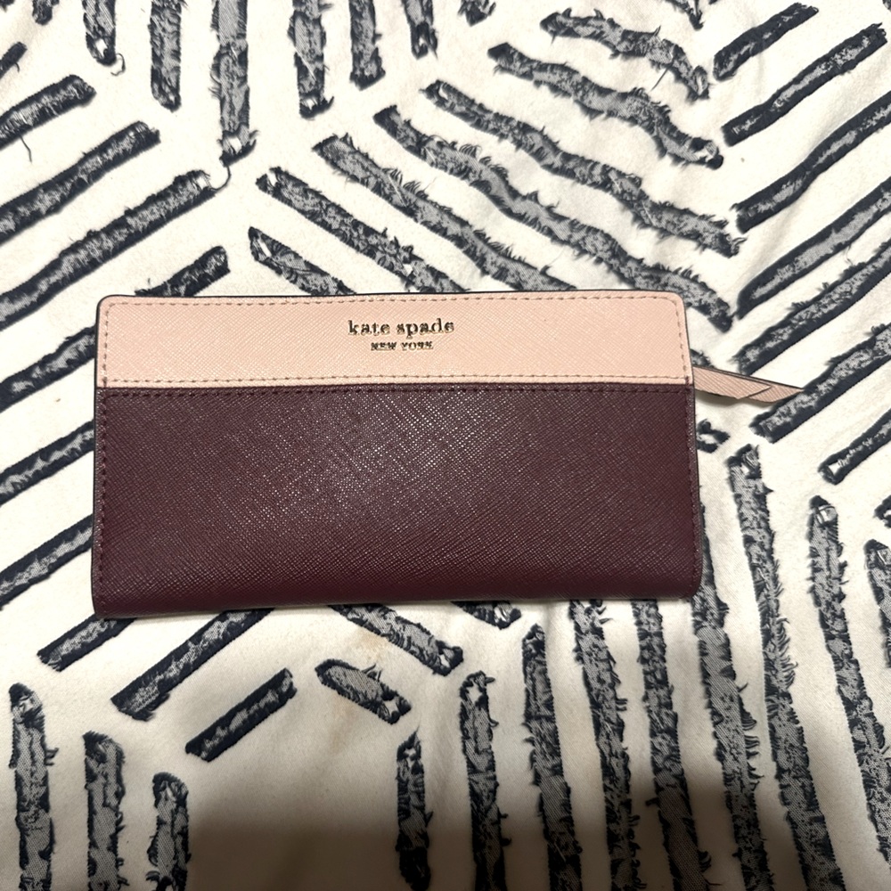 Kate spade wallet in maroon/mauve colors